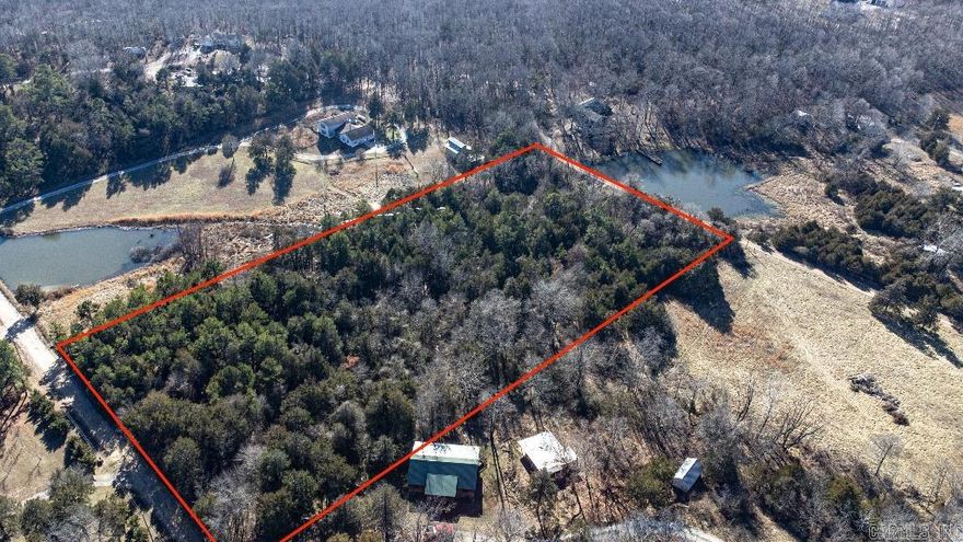 Looking for a ready-to-go property with flexibility and long-term potential? Look no further. This 4.92-acre parcel offers the perfect blend of privacy, utility access, and owner financing-making it a rare find!  Property Highlights: - Perc Test Passed - Septic ready, no guesswork involved. - Power Available - Supplied by Entergy at the road. - Mountain View Water - Reliable rural water supply to tap into.