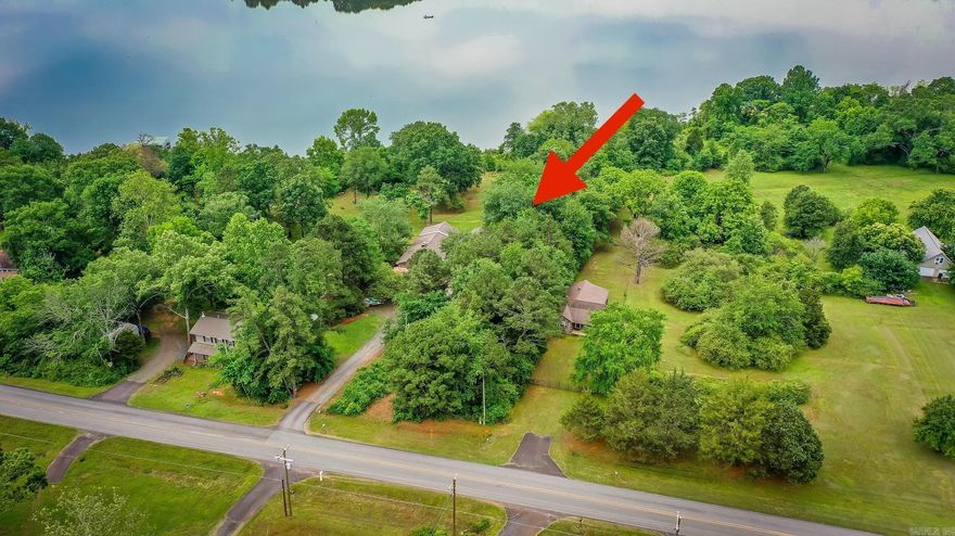 Lake front lot close to Choctaw Marina on Hwy 330.  Path to the Corp Property line has been cut where you can park by the road and walk the property.  Ask your agent for the documents online (Survey, Bill of Assurance, Etc. ).  (911 address to be determined).  Homes developed on both sides of the lot.