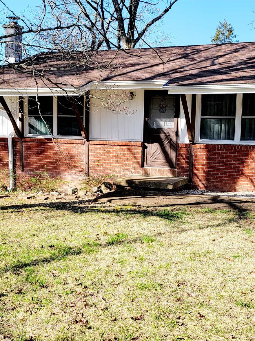 Welcome to your dream home in the heart of Cherokee Village! This beautifully updated 2 bedroom, 2 bath residence offers a perfect blend of modern amenities and timeless charm. *As you step inside, you're greeted by fully restored original hardwood floors that grace the main level, exuding warmth and character. The thoughtful updates include a newer roof, siding, appliances, flooring, paint, countertops, and more, ensuring both style and functionality for years to come. *The main level features a cozy electric log fireplace, creating a welcoming ambiance for gatherings or quiet evenings. For added comfort, a new wood stove awaits downstairs, promising warmth during colder months. *The fully finished walkout basement presents versatile space, ideal for additional bedrooms or a recreational area to suit your needs. With its large corner lot and level driveway on the side road, convenience meets practicality, offering ample parking and easy access. *Situated on Highway 175/Cherokee Road, a state-maintained thoroughfare, you'll benefit from swift clearance during inclement weather, ensuring hassle-free commuting year-round. *Don't miss the opportunity to make this your forever home. Sc