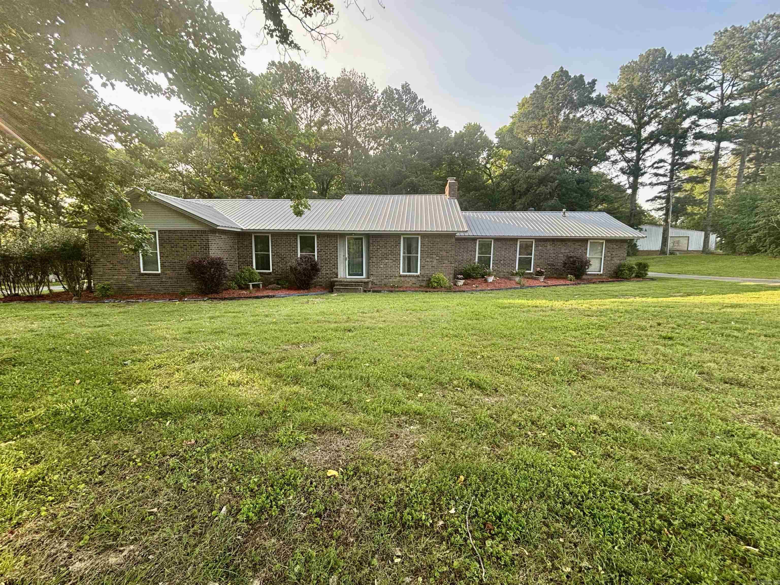 The possibilities are endless with this one. This home can be a 4 br with an office or a 5 bedroom home. There is a bonus room off of the kitchen to use as a man cave, or a larger family room for gathering. Right next to the Country Club making those days hanging at the golf course much easier. Enjoy the convenience of having a pool just steps away during those hot summer days. You will be in the city limits, but feel like you are in the quietness of the country at this location. Minutes from the highway to run to Searcy, and minutes from the grocery stores and schools. This neighborhood is a great place to get the evening walk in as well.