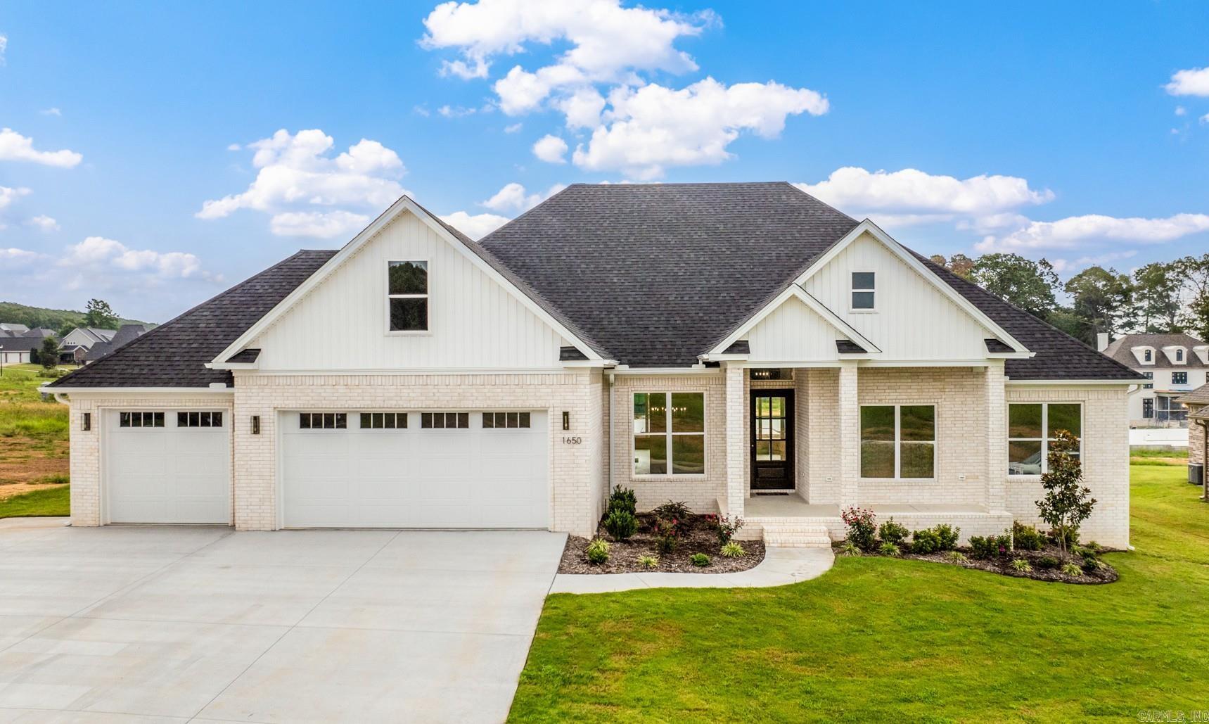 Gorgeous new construction home built by Enchanting Custom Homes. Home features so many upgrades and extras not always found including but not limited to huge kitchen island, farm sink, pot filler, convection microwave, soft close cabinets, upgraded appliances, gas cooktop, circulating pump for faster hot water, walk in pantry. Extra rebar in foundation, upgraded roof. Extra electrical outlets throughout. Tons of additional storage. Solid hardwood floors. Huge bonus room with a full bath can be used as an additional bedroom. Oversized screened in patio with a fireplace