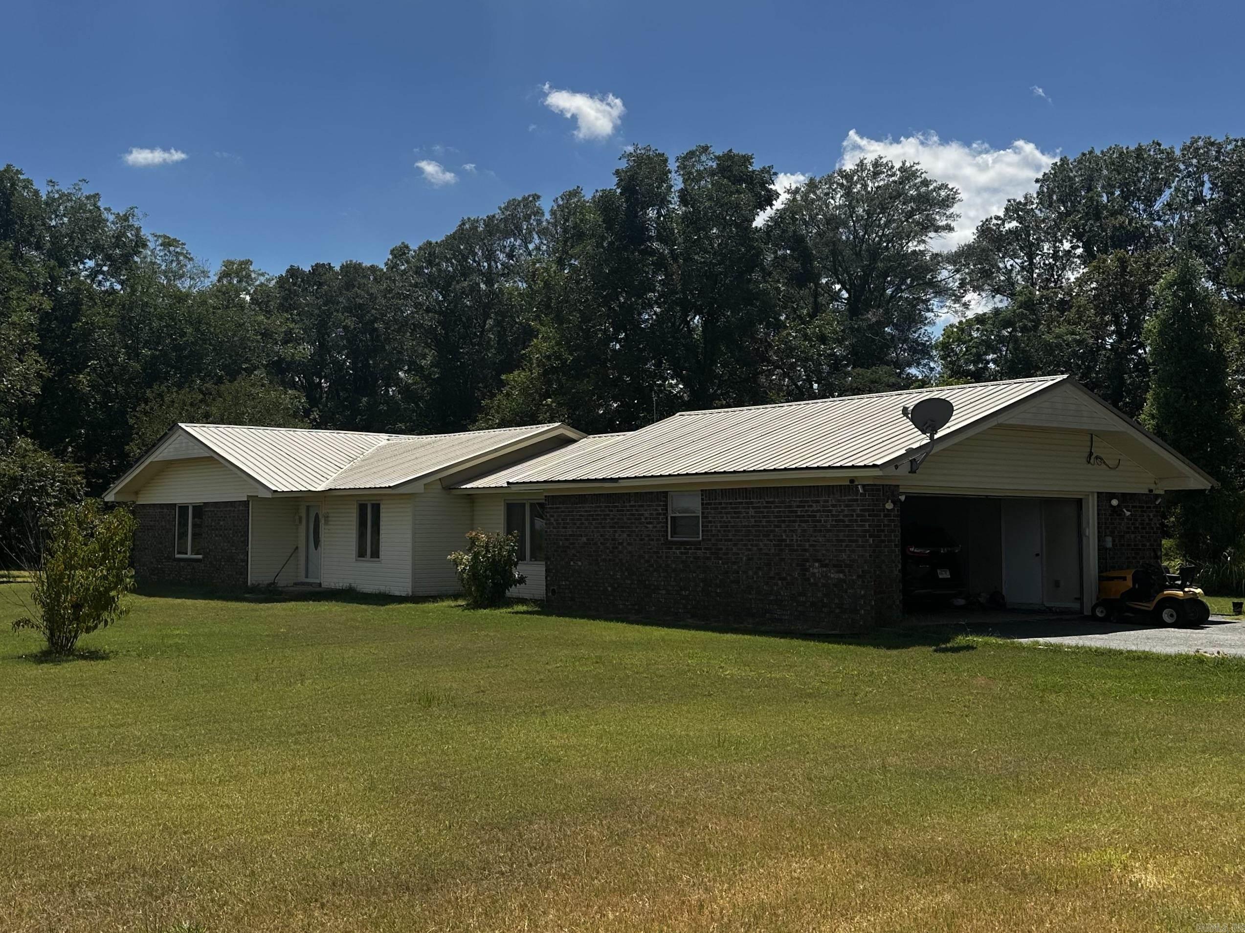 Nestled on 1.43 acres in Desha County, this spacious 2,120 sq ft home offers a quiet escape to the countryside. Featuring two bathrooms and an effective age of 25 years (per tax records), the property is being sold as-is under a court order. Currently occupied, showings will require advance notice. While not guaranteed, the occupant may be open to staying on as a tenant, offering potential income for investors. Whether you're looking for a place to call home or a promising investment opportunity, this rural property is worth a closer look. (See Agent Remarks)