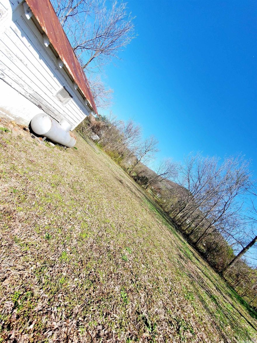 If you are on the hunt for a place to call home in Marshall, this may be it! This lot is just under half an acre, is surrounded by tree a tree line for privacy, and already has all utilities on the property!  It is ready for you to start your build or bring in a mobile home!!  *Property is being sold as it is, with both the shed and propane tank conveying with property.