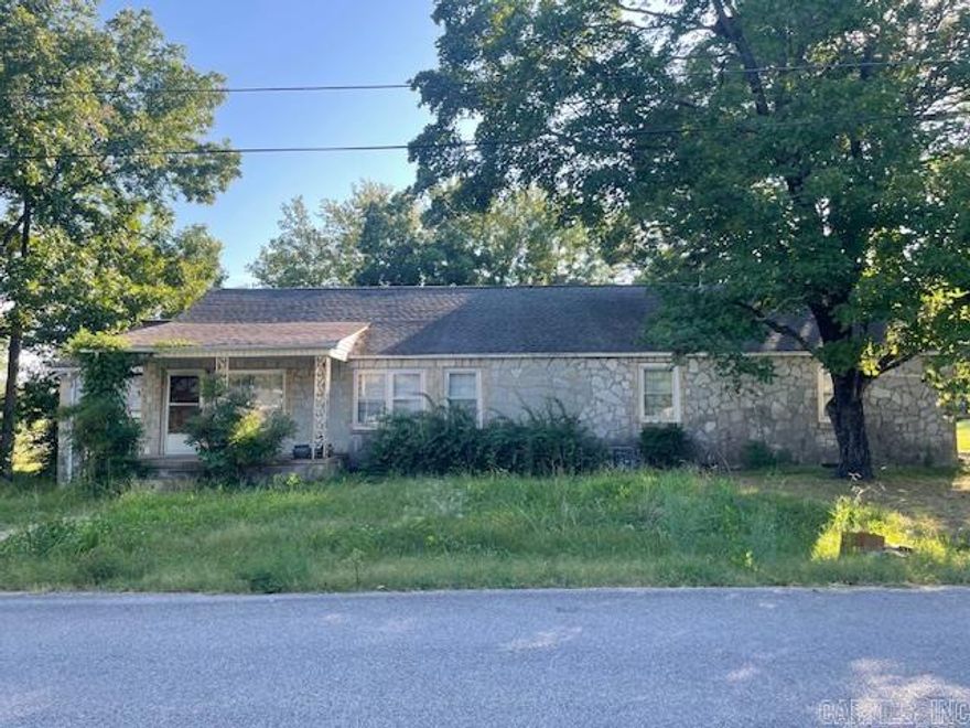 Opportunity awaits with this approximately 2831 square foot fixer upper home, which includes a 3-bed 1-bath living area on one side and what was once a dentist office on the other. The living 3-bedroom side is almost move in ready with 3 large bedrooms and hardwood flooring throughout the home. It also has a large den/bonus area adding extra space. The old office side of this home has a half bathroom and several large rooms giving endless possibilities to this space.  This home will be sold as is with no repairs being made by seller. Investors are welcome.  See Agent Remarks.