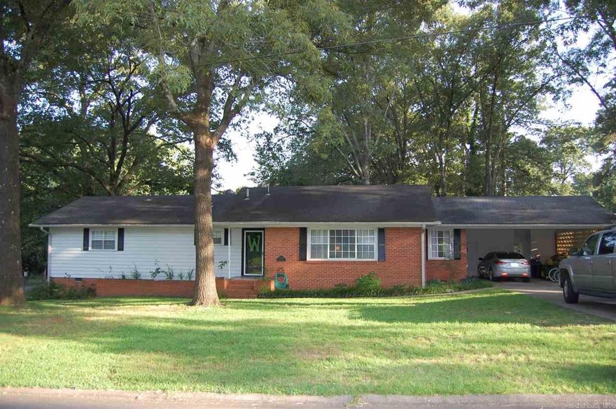 **Heights Home in Benton**This is a beautiful updated home that includes 3 bedrooms, 2 full bathrooms with two living areas.  Updated and painted throughout.  Fully fenced backyard and includes 3 lots on the corner. New Stove, AC unit only 1 year old, Roof approx. 10-12 years old. New Hot water heater. Lots of storage in two car carport attached to home.  Schedule your showing today!!