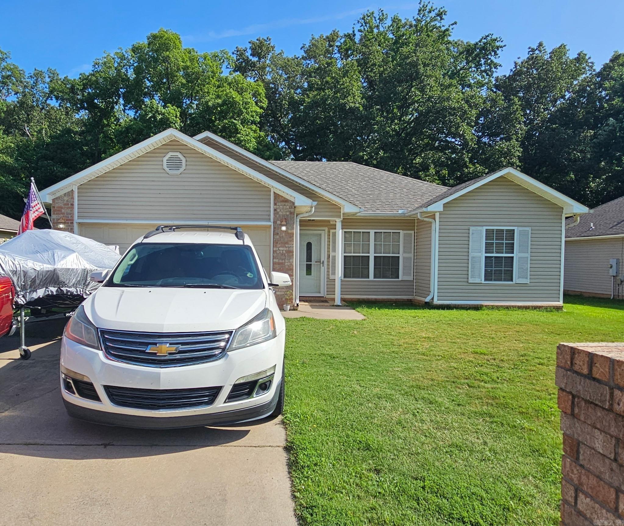 This home is located close to Ward Central Elementary. It is three bedroom and two baths with a double garage. The large fenced backyard has a nice storage building. It has solid surface counter tops. This home has a a new architect. roof installed in 2024.