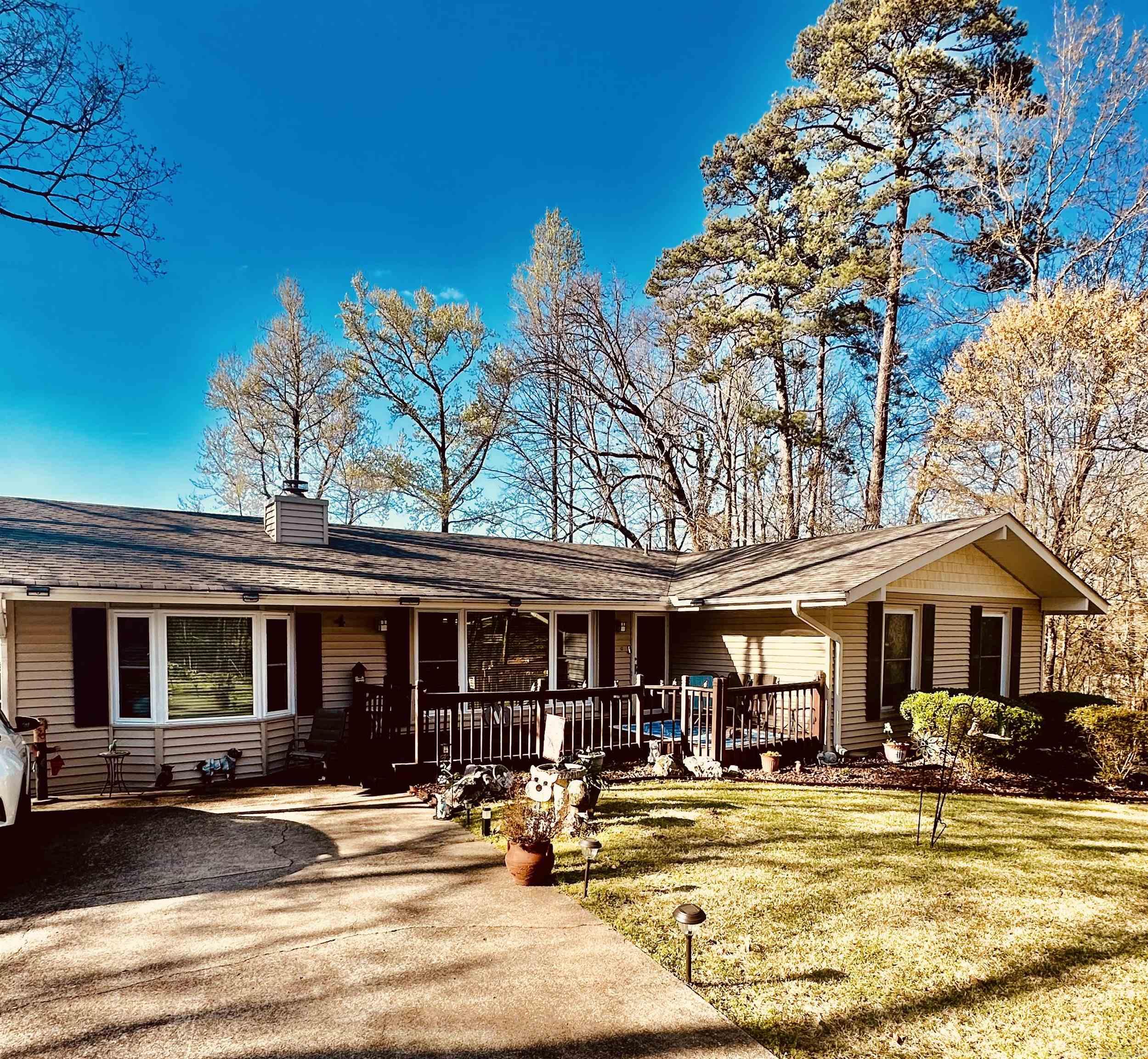 Darling home in the De Soto golf course neighborhood. This immaculately maintained residence has 3 bedrooms and 2 baths, offering spacious living across 1916 square feet. Enjoy the cozy ambiance with a wood-burning fireplace, perfect for relaxing evenings. Open floor plan, large pantry. Spacious primary suite with an extra-large walk in closet. Roof replaced in March 2024! Step outside onto the inviting wraparound porch, ideal for savoring morning coffee or evening sunsets. The property is beautifully landscaped, creating a serene outdoor oasis. This darling home offers comfort, style, and the perfect setting for your next chapter. Schedule your tour today and make this your forever home!