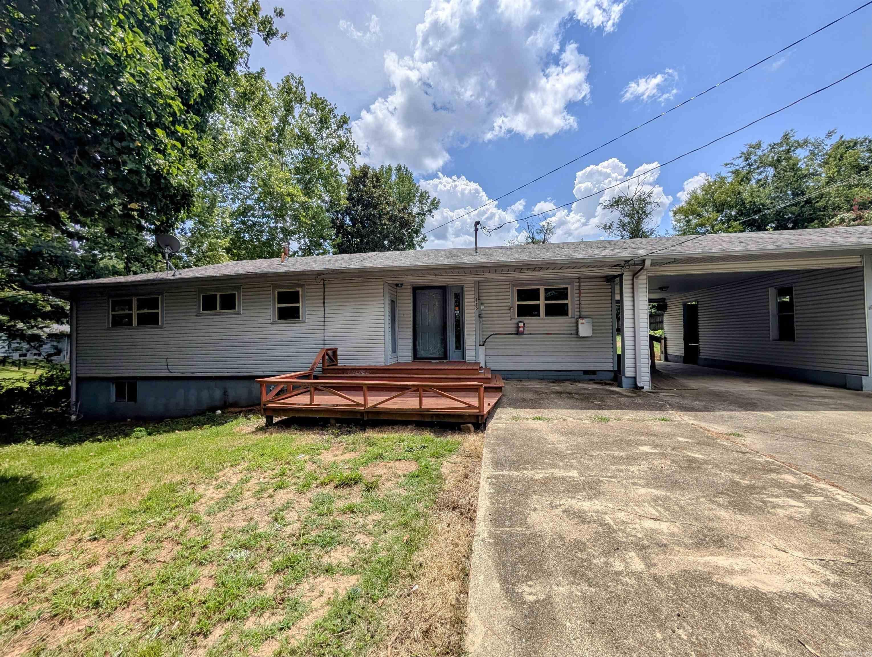 Lots of room in this property, with a heated basement! Located on almost half an acre, has a handicap ramp into the home and a handicap accessible primary bathroom. Laundry/sun room, outbuilding with lots of storage space, open concept living and dining area, large primary bedroom, stainless steel kitchen counter-tops, and the basement is 1120 sq ft, partially finished. Generac generator and attic fan. So many possibilities! Offers to be made thru res.net.