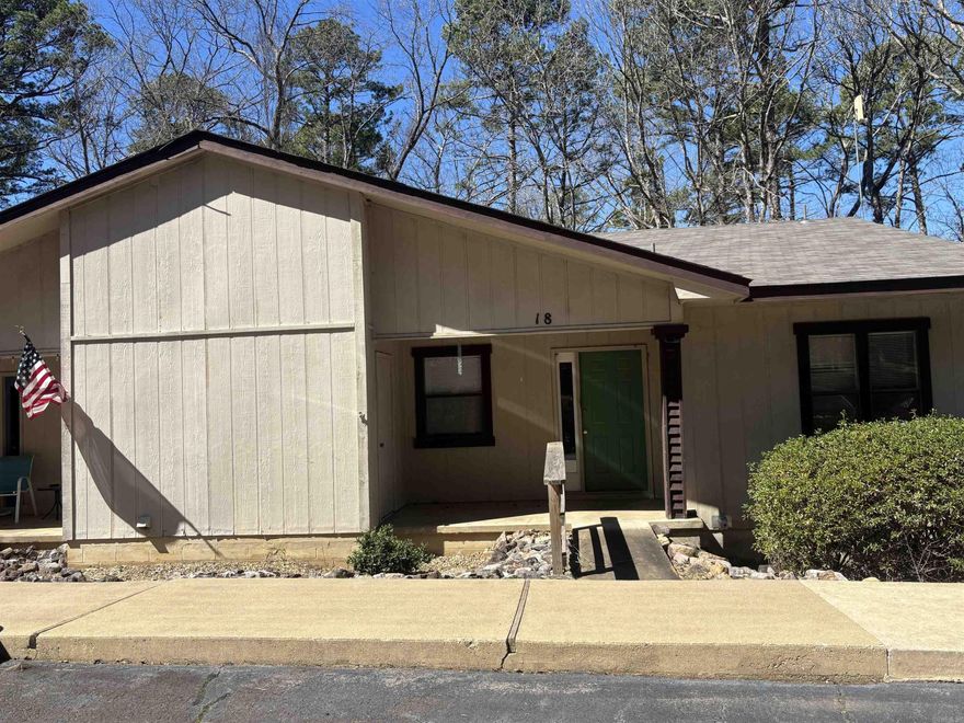 One-story townhome close to West gate amenities.  Located in a quiet, peaceful neighborhood.  Investment or primary home.  New carpet in living/dining room.  Two bedrooms, one full bathroom and one-half bathroom.  Enjoy the back deck that extends from outside the living room to the master bedroom.   Refrigerator, washer and dryer to convey.  New property owners have a $2,000.00 new member buy in fee due at closing.