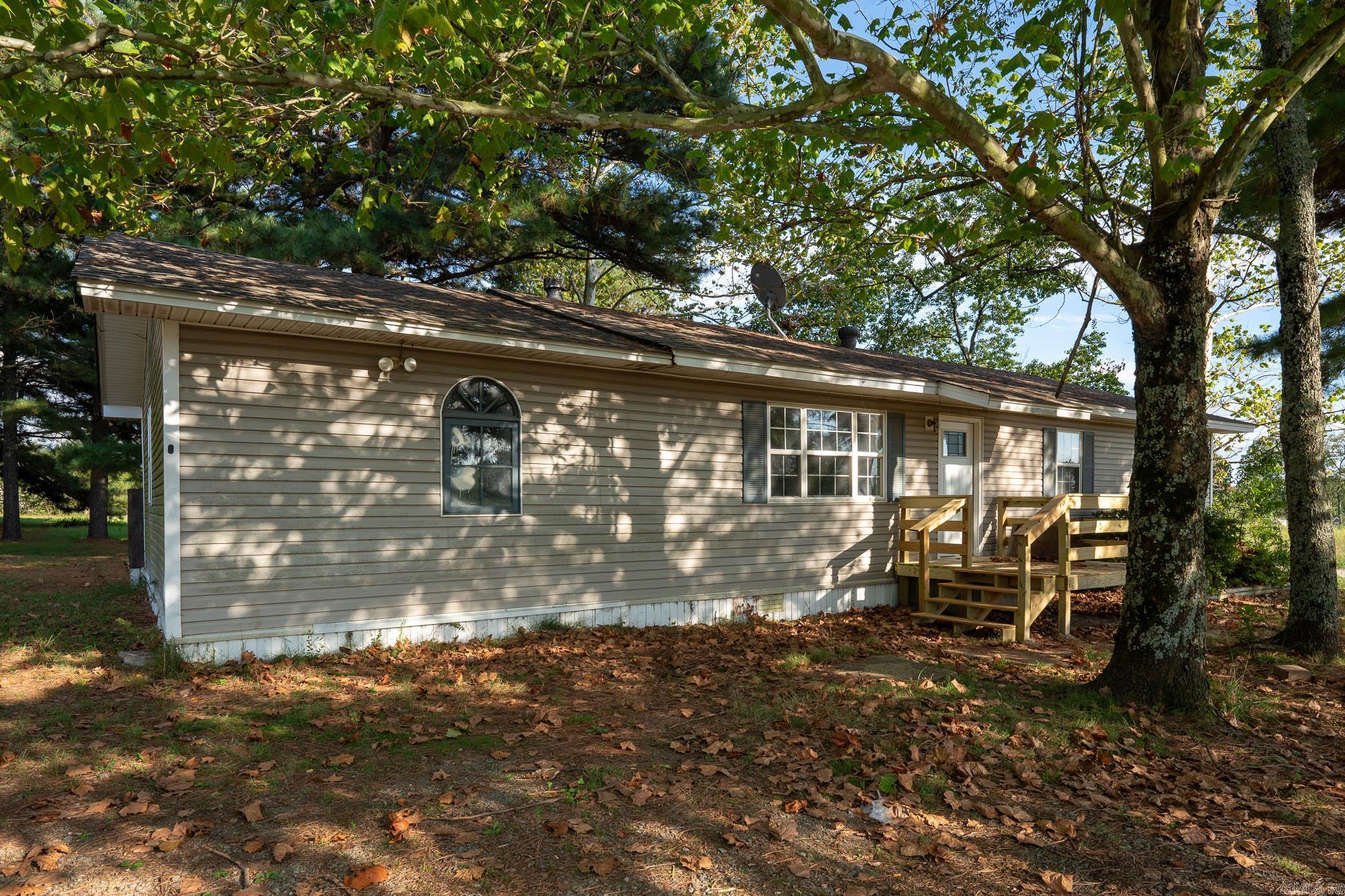 Welcome to 392 Yankee Road, Judsonia, AR ā a beautifully refreshed 4-bedroom, 1-bath home situated on a spacious lot in a peaceful country setting. This home offers a generous 1,608 sq. ft. of open and airy living space, featuring recent interior updates and a detached shop for additional storage or projects. Upon entry, youāll find a bright, welcoming living area with new flooring throughout, neutral tones, and plenty of natural light streaming in through the large windows. The open-concept design flows seamlessly from the living area into the kitchen and dining spaces, creating a perfect atmosphere for relaxing or entertaining. The four well-sized bedrooms provide plenty of versatility, whether for living, working, or extra storage. Outside, the property features a large yard with plenty of space for outdoor activities, as well as a detached shop that offers ample room for hobbies, projects, or additional storage. The quiet, rural location offers tranquility and privacy, while still being conveniently located just a short drive from Searcy and local amenities. Donāt miss out!