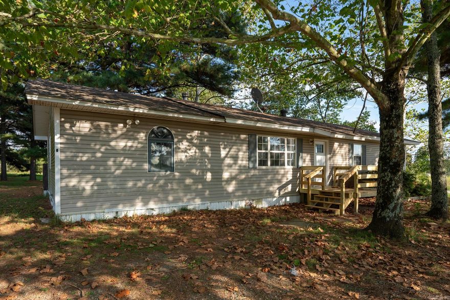 Welcome to 392 Yankee Road, Judsonia, AR — a beautifully refreshed 4-bedroom, 1-bath home situated on a spacious lot in a peaceful country setting. This home offers a generous 1,608 sq. ft. of open and airy living space, featuring recent interior updates and a detached shop for additional storage or projects.  Upon entry, you’ll find a bright, welcoming living area with new flooring throughout, neutral tones, and plenty of natural light streaming in through the large windows. The open-concept design flows seamlessly from the living area into the kitchen and dining spaces, creating a perfect atmosphere for relaxing or entertaining. The four well-sized bedrooms provide plenty of versatility, whether for living, working, or extra storage.  Outside, the property features a large yard with plenty of space for outdoor activities, as well as a detached shop that offers ample room for hobbies, projects, or additional storage. The quiet, rural location offers tranquility and privacy, while still being conveniently located just a short drive from Searcy and local amenities.  Don’t miss out!