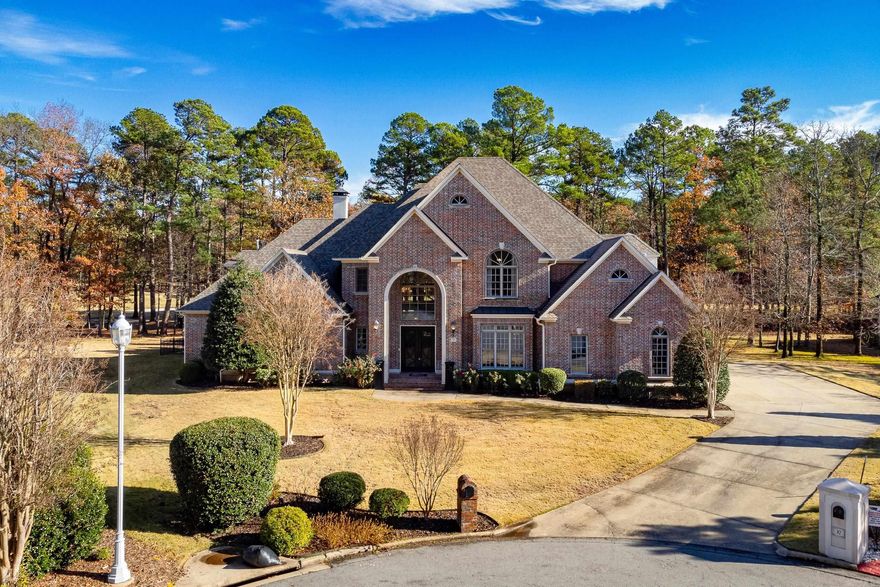 Gorgeous Chenal home nestled at the end of a cul-de-sac overlooking Bear Den Golf course. So many outstanding features in this large and beautifully updated estate home. New floors, paint and marvelous kitchen and primary bath re-models. Soaring ceilings, tall windows and plenty of natural light. Totally redesigned kitchen has large island, custom cabinetry, porcelain countertops and Hallman professional gas range. Large family hearth room with plenty of cabinets, formal and informal dining areas and impressive formal living area with views of the pool and outdoor living space. Fantastic primary suite with exquisitely updated bath. Guest bedroom suite or office also on main level. Four bedrooms up with 3.5 baths as well as theater/bonus room. 3 car side load garage, lush landscaping and much more! Come See!