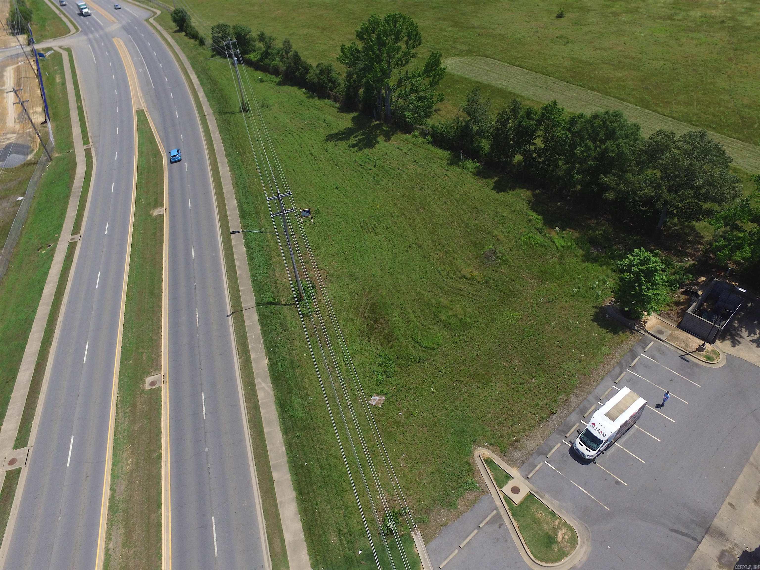 Prime commercial lot available on Dave Ward Drive, offering 0.85 acres of land and an impressive 491 feet of road frontage. Zoned C-3, this property offers endless possibilities for commercial development. With an average daily traffic count of 34,000 vehicles, the exposure is unparalleled, providing a lucrative opportunity for businesses seeking high visibility and accessibility. Don't miss out on this exceptional investment. *Third picture is a concept for a 4,500 SF building.