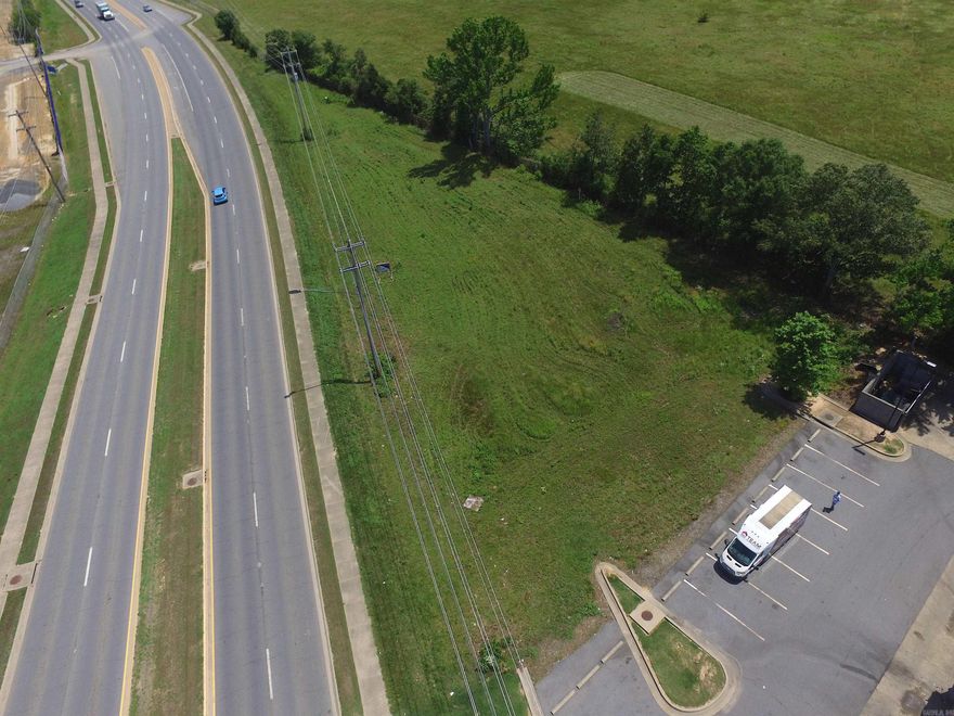 Prime commercial lot available on Dave Ward Drive, offering 0.85 acres of land and an impressive 491 feet of road frontage. Zoned C-3, this property offers endless possibilities for commercial development. With an average daily traffic count of 34,000 vehicles, the exposure is unparalleled, providing a lucrative opportunity for businesses seeking high visibility and accessibility. Don't miss out on this exceptional investment. *Third picture is a concept for a 4,500 SF building.