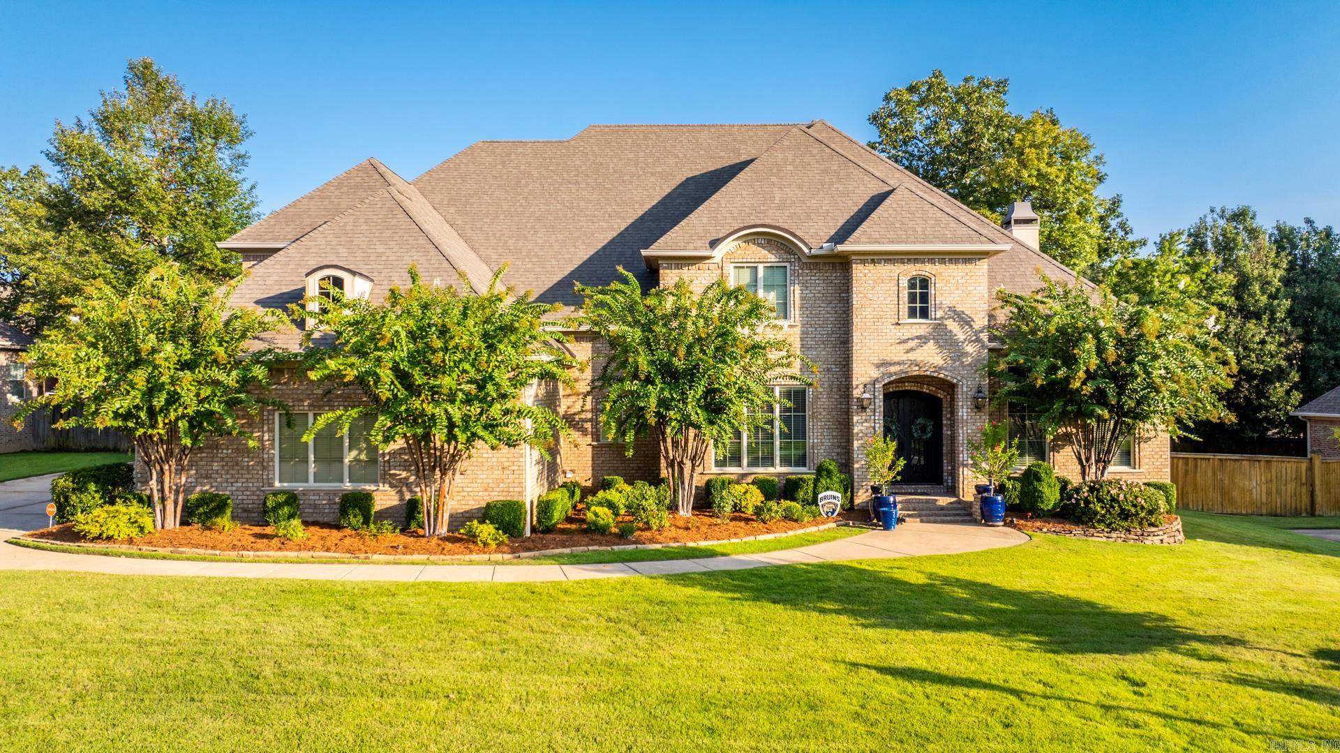 We are in the highly desired Courts of Chenal - to check out this beautiful 4 bed 4.5 bath. Inside, youāre welcomed with the immediately impressive arched entry with the stately office to the right and formal dining to the left. This large living has the gas log fire wrapped with library built-ins, and opens nicely to your immaculate kitchen that highlights the gorgeous granite breakfast island, sizable breakfast area, and access to your veranda with the second fireplace, overlooking your flat and fully fenced yard with the raised garden bed. Privately set apart on the main level is the beautiful primary suite with the dual vanities, spa tub, walk-in seated shower, and walk-in closet. Also on the main level is the big laundry and private half bath. Take the stairs to find your awesome bonus room setup with the kitchenette, as well as the additional 3 beds & 3 baths, plus easy access to so much storage at the attics. Donāt miss the workshop setup in your 3 car side entry garage. Weāre excited for you to come and see if itās yours!
