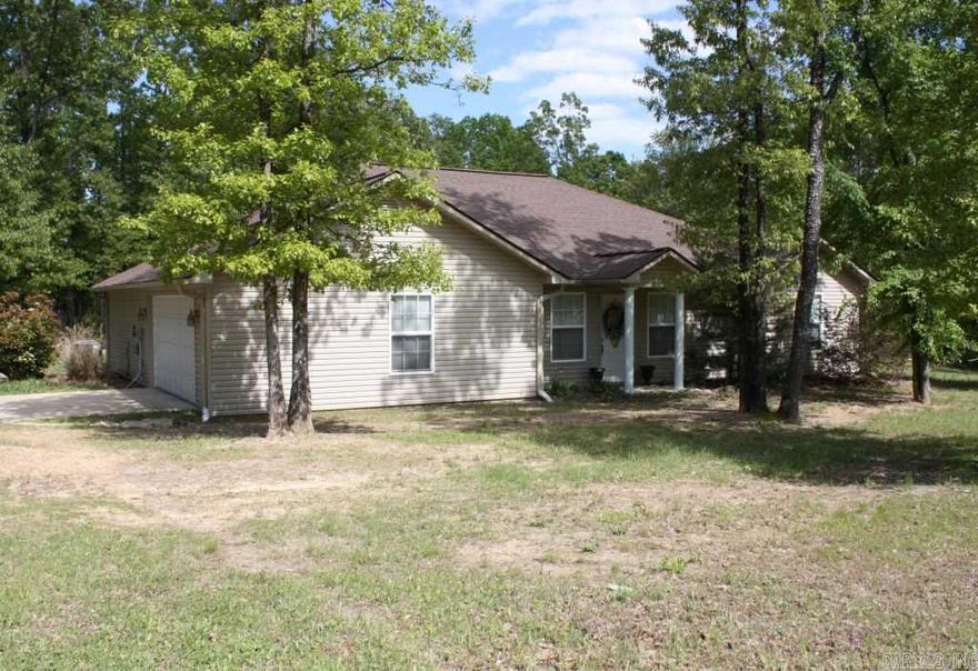 Delightful and Spacious!!  Living Room features high vaulted ceiling and is open concept to dining room and kitchen.  Neat 3 bedroom/2 bath arrangement.  Located at the edge of Mena, this one owner 1756 sq ft home plus attached garage is on 4.26 acres!!