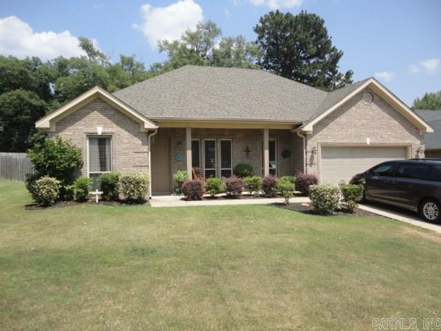 Very nice 1 level has split bedroom plan. Open concept with tall ceilings and beautiful stained concrete floors in entry, dining, kitchen and breakfast area and both baths! Granite counters in kitchen and SS appliances including refrigerator, built in microwave, stove and DW! Spacious Master has huge walk in closet and separate vanities and separate whirlpool tub and shower. Large privacy fenced level back yard. Available Now. Bauxite Schools!  Can see anytime!  $1395/mo. See others at Ark Houses .com