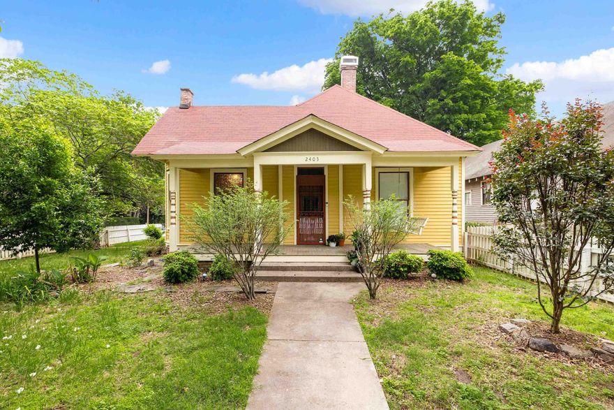 Downtown living at its finest- a welcoming porch, original hardwood floors, ornate details, tall ceilings, and friendly neighbors- with modern updates for your comfort. Wonderful natural lighting with huge windows throughout, and multiple living spaces to make your own. The kitchen, with its butcher block countertops and new dishwasher and oven, leads to the separate laundry room with access to the private deck in backyard for late night evenings in the summer! Leave your worries behind in this completely renovated bathroom, with rainbow light coming through the window as you soak in the tub or enjoy time in your spacious shower. All major systems (HVAC, roof, water heater, deck, and storm doors) have been updated and are less than 6 years old- what a wonderful way to get to experience historic home life without the stress of dated systems! Please note: photos with furniture are virtually staged.