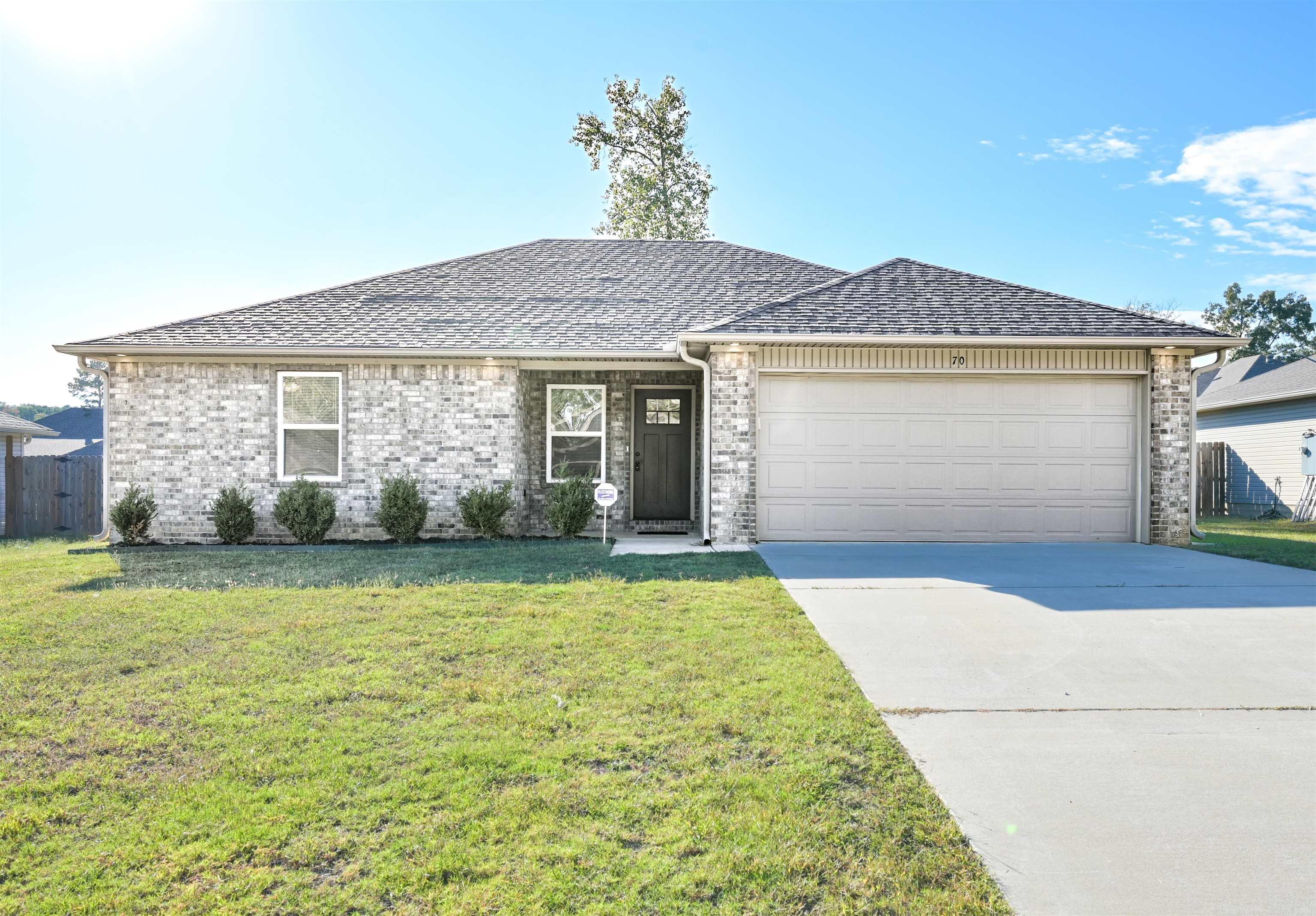 Beautiful brick and siding home featuring an open floor plan with vaulted ceilings! Kitchen includes granite countertops, stainless steel appliances, and custom trim details throughout. Modern finishes include LVP flooring, tile and beautiful fixtures.  Enjoy a private, fenced yard with covered patioā all in a great location close to everything!