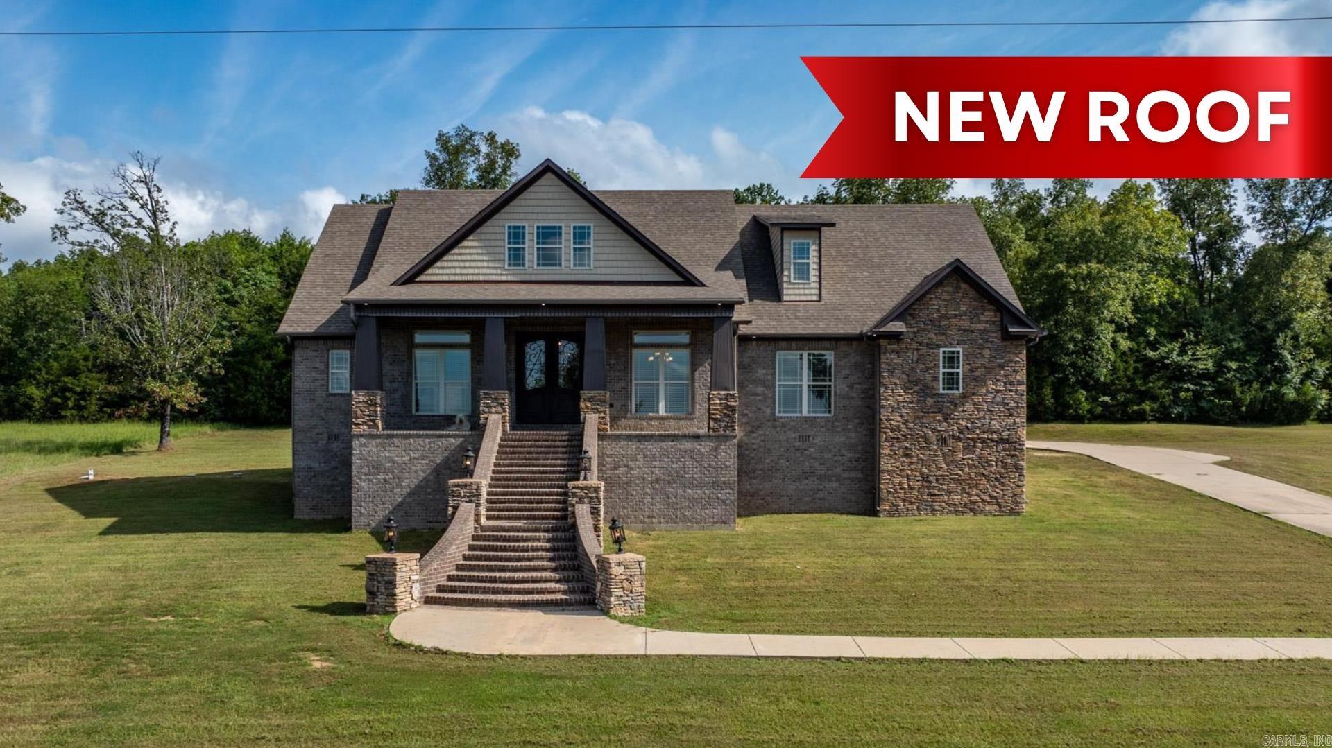 This stunning home offers 4 bedrooms, 3 and 1/2 baths with over 3200 square feet. The large kitchen offers an expansive eat in area plus a bonus area for an office or playroom. The home is flooded with natural light through its impressive large windows creating a bright and welcoming atmosphere throughout. One of the standout features is its location in this quiet and private neighboorhood. This home sits on a one acre generous lot and does have two lots for sale on either side by individual sellers. Storage concerns will be a thing of the past, thanks to the overabundance of storage solutions thoughtfully integrated throughout the home. There is 2 large storage spaces located under the home as well and plenty of floored attic space. Oversized garage as well as a safe room.