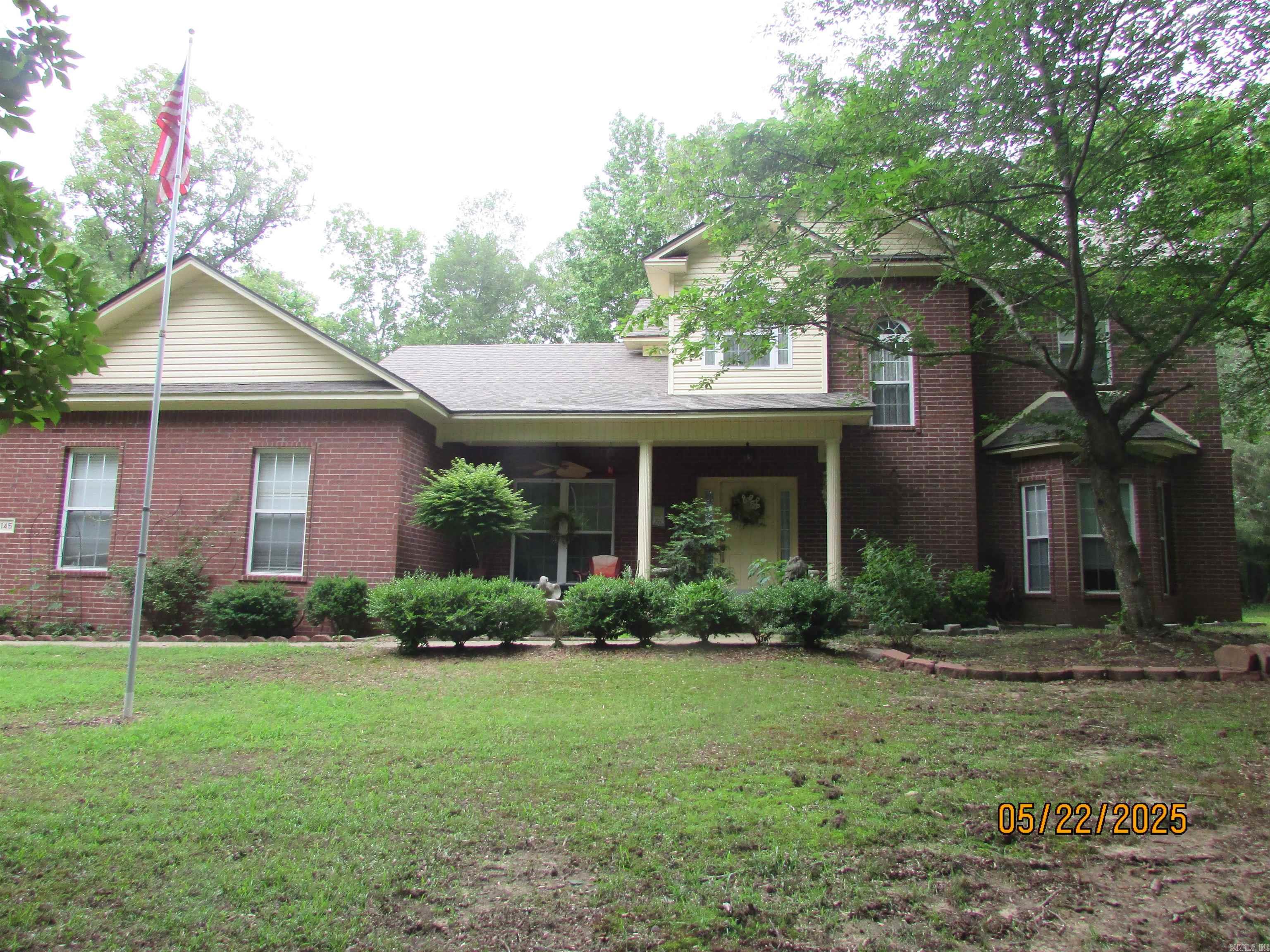 Looking for privacy? This is the one!! Nestled in the woods, this nice 4 bed, 3 bath home has so many extras to offer. Large open kitchen with a breakfast bar, nice pantry and a built in desk Breakfast area and den share a two sided gas fireplace. Primary bedrm downstairs and the primary bath has double vanities, jetted tub and a separate shower. Formal dining room and the guest bedrm/office down stairs. 2 bedrooms and a full bath upstairs. HUGE walk in attic perfect for storage or converted to a bonus room. Bamboo flooring in 2015, new carpet 2021, new water heater 2021, roof 2023, garage door 2022 and dishwasher 2025. Home was wired for security system but they never installed it. Fenced area in back yard. Large storage shed. What else could you want. **Agents see remarks**