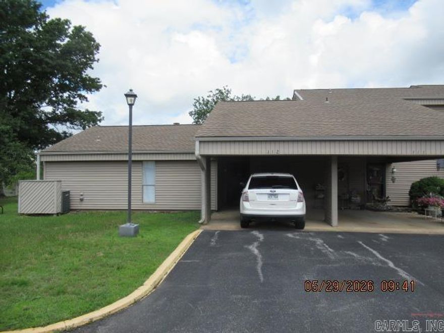 This beautiful ONE-LEVEL condo with a carport may be just what you need to relax and enjoy the beautiful community of Fairfield Bay, Arkansas!  Along with 2 beds there are 2 baths, including a Safe-Step walk-in tub/spa with shower.  The large room addition has great storage.  You'll have plenty of room to entertain.  It has been professionally cleaned, so you can move right in!  Walk to the Senior Center, the Hart Center, restaurants, and more.  AND there is a pool onsite.  Call to see one of the best condos in town!