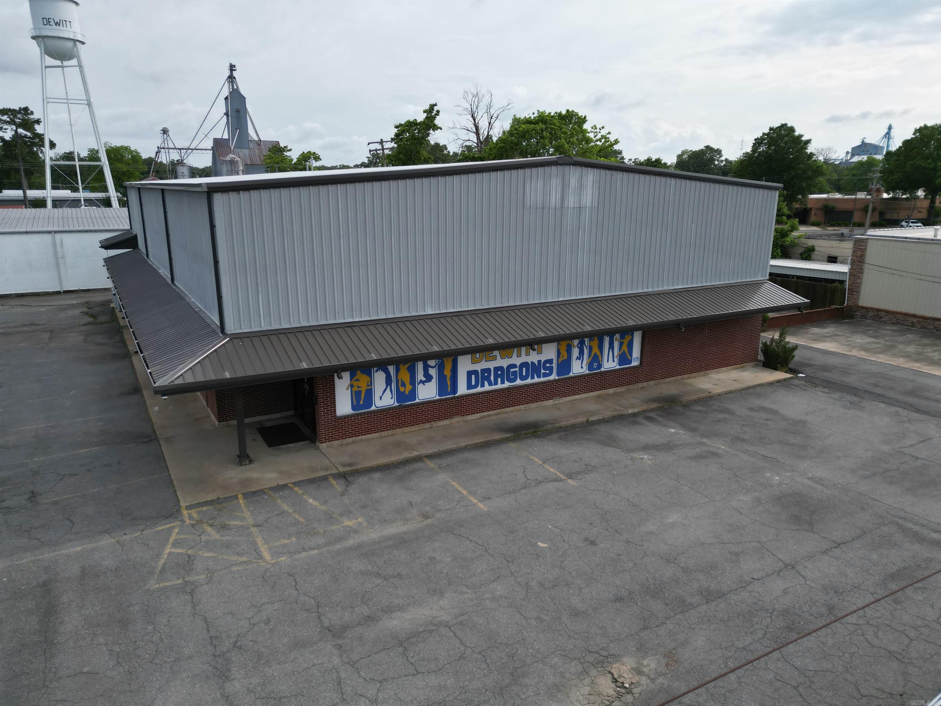 Are you looking for an established successful business that runs itself? This one is turn key! This is the only state of the art heated and cooled baseball/softball/training facility in all of south Arkansas. Potential for growth is exponential! Building has NEW EVERYTHING. The owner completely renovated this over 14,000 sq ft building in 2020 and put all new electrical, super insulation, plumbing, HVAC, lighting, flooring and paint. 2 brand new restrooms, one is handicap accessible. Six 12x30 turf batting cages and Two 14x70 turf pitching lanes downstairs and 5500 sq ft turf infield training area, 18x105 turf training lane and arm care/strength center upstairs. 2 Home Plate Programmable Pitching Machines, 2 Atec defensive machines and all training equipment is included. Security/Camera system and key fob billing allows members to work out independently. See agent remarks.
