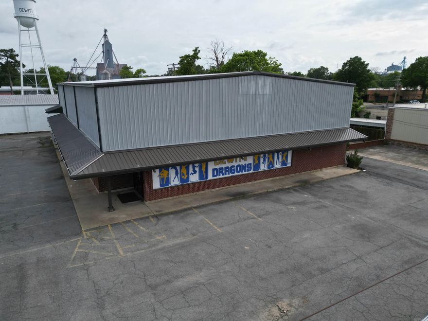 Are you looking for an established successful business that runs itself? This one is turn key! This is the only state of the art heated and cooled baseball/softball/training facility in all of south Arkansas. Potential for growth is exponential! Building has NEW EVERYTHING. The owner completely renovated this over 14,000 sq ft building in 2020 and put all new electrical, super insulation, plumbing, HVAC, lighting, flooring and paint. 2 brand new restrooms, one is handicap accessible. Six 12x30 turf batting cages and Two 14x70 turf pitching lanes downstairs and 5500 sq ft turf infield training area, 18x105 turf training lane and arm care/strength center upstairs. 2 Home Plate Programmable Pitching Machines, 2 Atec defensive machines and all training equipment is included. Security/Camera system and key fob billing allows members to work out independently.  See agent remarks.
