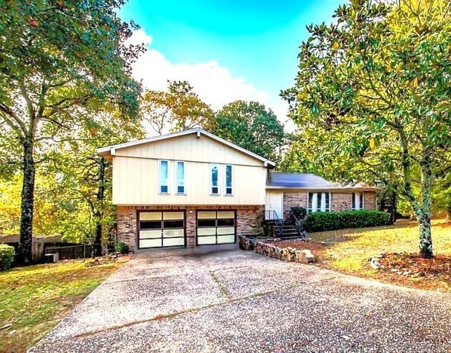 Discover your next home—freshly renovated with a new roof, paint, flooring, and deck. Enjoy a modern kitchen with stainless steel appliances and a craft/hobby space in the garage. This inviting residence offers unparalleled convenience: minutes from Starbucks, Fresh Market, Trader Joe’s, golf courses, athletic clubs/gyms, and outdoor activities like cycling, hiking and boating.   This home is Currently Zoned for Don Roberts Elementary, Pinnacle View Middle, and Central High and could be perfect for your family. The quiet, friendly neighborhood features morning walks with neighbors and wildlife sightings. Downtown Little Rock is a about 10-15 minute drive, Maumelle is approximately 5 minutes away, and Conway is roughly 26 minutes away.   Furnished rental options available. Please contact listing broker for more details!