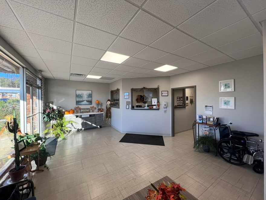 Commercial Building with 3 year lease. This 2054 finished main floor square foot building sits over a full unfinished basement. Currently leased out as a medical clinic. With a new rubber roof in 2021 the main floor of the building had been renovated by the medical clinic circa 2020. There is a welcoming waiting area with a half bath, receptionist room, employee half bath, lab room, 3 exam rooms, provider office and a large back room serving as an office and breakroom with additional equipment storage.