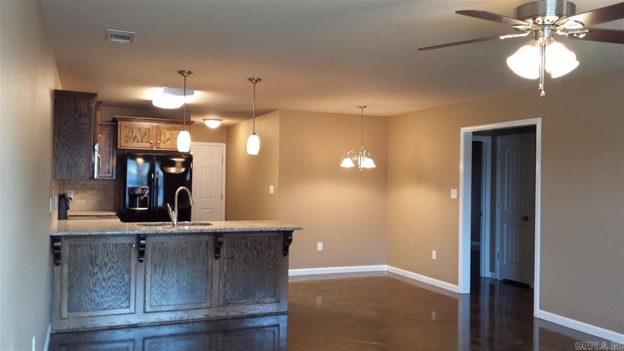 This craftsman style duplex is close to everything in Benton! Walking dist to Wal-mart, McDonalds, Kroger,police station and historic downtown shops & dining. Stained concrete floors, granite, new appliances, upgraded lighting fixtures, open layout, master bedroom with full bath, sep laundry rm with pantry,outside storage, cute covered front porch and private fenced backyard in a quiet area. 1 yr lease required,$1150/mo, $1150 deposit, $500 non-refundable dog deposit. Txt for application 501-909-2671.