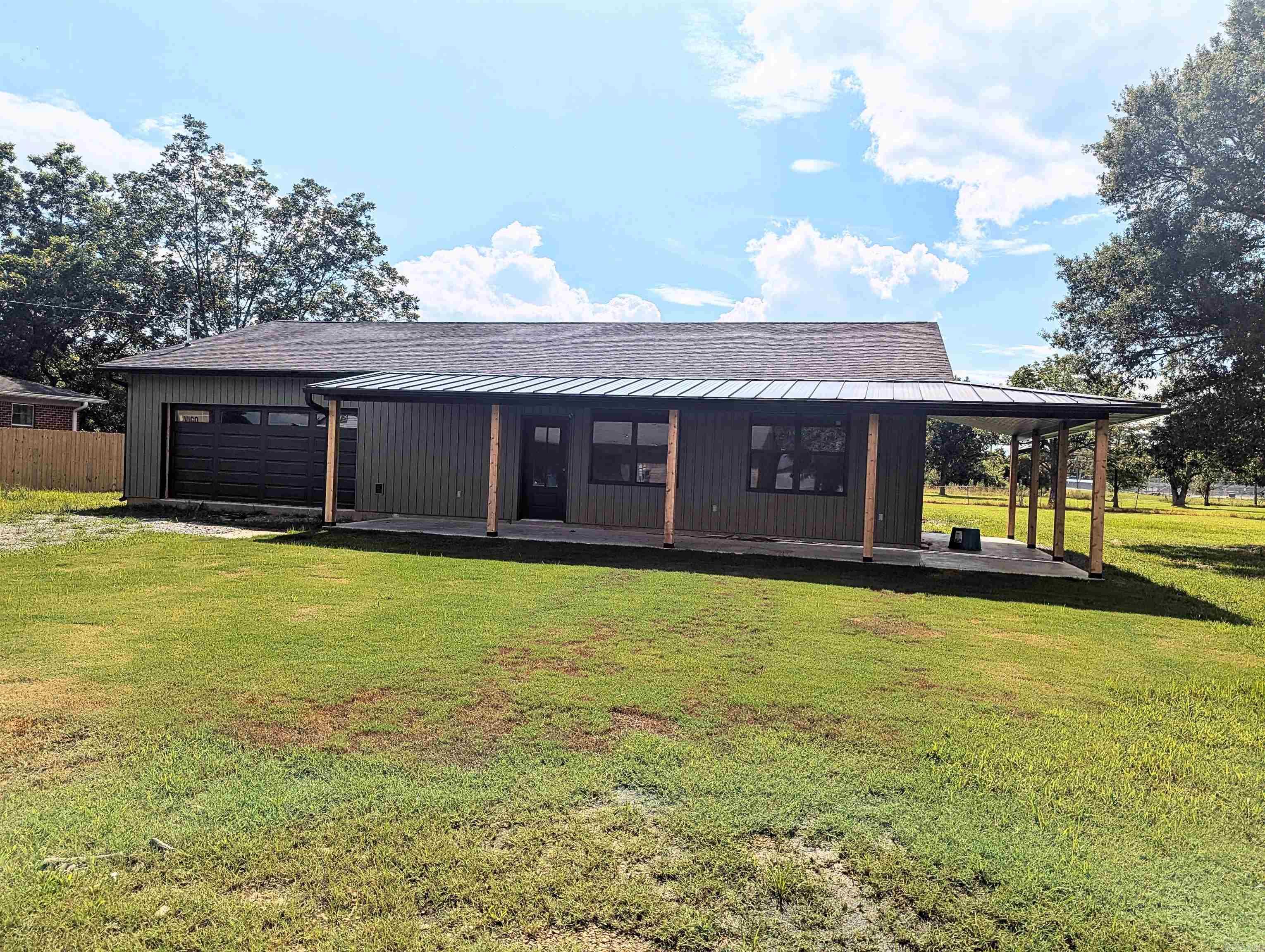 Gorgeous, contemporary, craftsman-style, new construction home now available! Not too often do you get the chance to purchase a new construction home in Rector, and now is your chance! This beauty boasts an open floor plan, wrap around covered porch, beautifully tiled shower, and large walk-in closet. This chic kitchen has a beautiful island for looks and functionality.