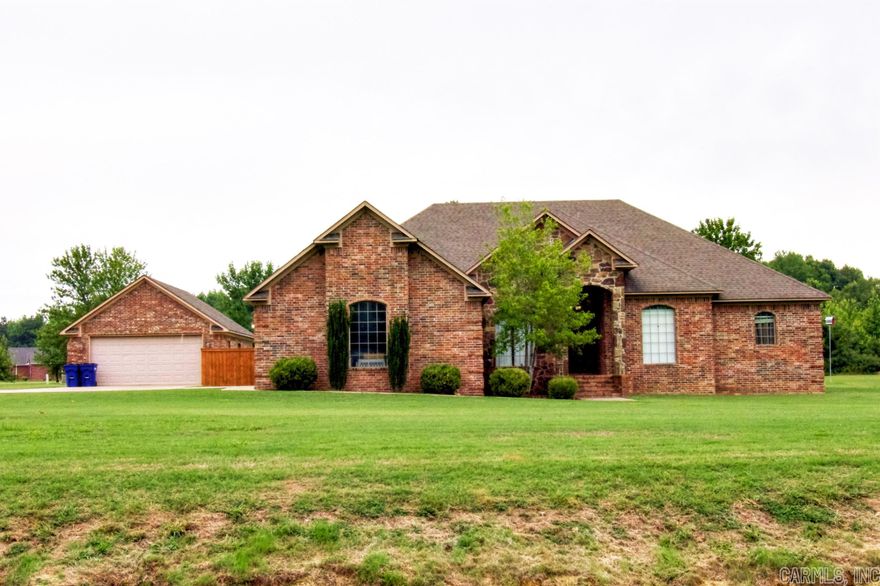 Welcome to your new home in a family and pet-friendly neighborhood that offers you room to breathe! This home is a stunning, 4 bed/2 bath, 2468 sf home on 1.82 acres. Features include a fireplace, in-ground pool (slide and diving board too!), hot tub, additional detached garage, storm cellar, fiber internet, landscaping, and more! Home is located in the award winning Greenbrier School District. HVAC new in 2022, pool installed in 2021, and new roof coming soon. Make sure to check out the 3D tour and drone video! Agents see remarks and documents for more details.