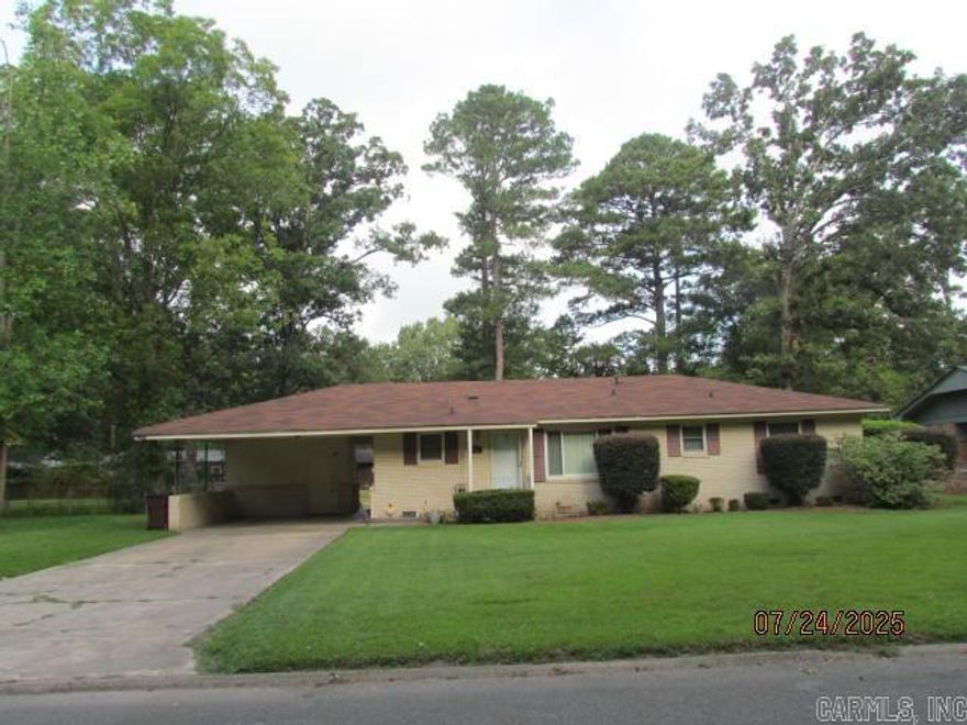Seller will pay up to $5,000 on Buyers Closing Cost with acceptable offer.This lovely home has a Great location for families with Pecan Street being one of the widest streets in town, good for families to ride bikes.  Also the home is located Close to Anderson Elementary School and the exercise Park and also major employment, city amenities and sports complex.   This beautiful home features original beautiful hardwood floors, living room, den/dining/kitchen combo with vinyl flooring, three bedrooms with large closets, master has a large walk-in closet, Hall bath is large with double sinks and shower over bathtub.  Master bath features a walk-in shower and pedestal sink.  The Laundry room is located in large storage room off carport.  A storage building was moved from the large backyard and that is why there is a blank dirt spot.  Back yard also has a Partial fence up and the other  fencing with a double gate that was taken down to remove storage building will be left with property that can be reinstalled.  Roof is 2 yrs old. New windows have been installed in the front and sides of the house, but not on the back of thee house.  This home is just waiting for you and your family.