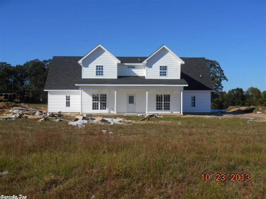 ROAD INTO SUBDIVISION WILL BE PAVED. FANTASTIC LEVEL LOT WITH GREAT VIEWS OF LAKE. FANTASTIC LOT AND GREAT AFFORDABLE HOME. THIS HOME IS A 3 BED, 2 BATH HOME. IT HAS LAMINATE HARDWOODS, GRANITE COUNTERTOPS, AND MUCH MORE