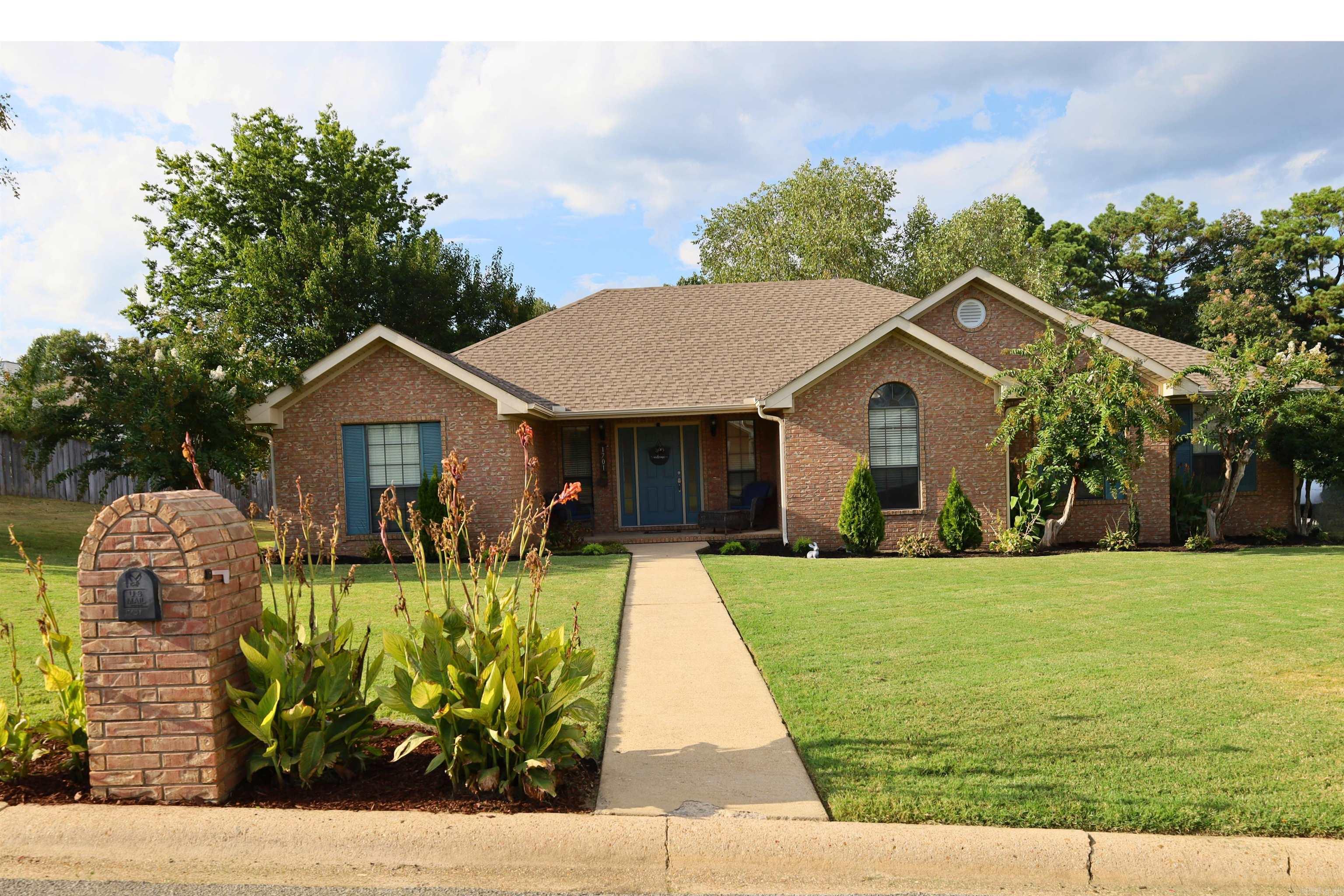 Discover a charming and well-maintained 3-bedroom, 2-bathroom brick home, offering 1,950 sq ft of comfortable living space. This property features a private fenced yard, perfect for outdoor entertaining or relaxation. Enjoy the beautiful pergola, providing an inviting outdoor seating area. The home boasts a freshly painted interior and a cozy gas fireplace for warmth and ambiance. The split floor plan allows for added privacy and convenience. The newer roof installed in 2020 ensures peace of mind and low maintenance. Don't miss this opportunity to make 1701 Robinwood Street your new home!