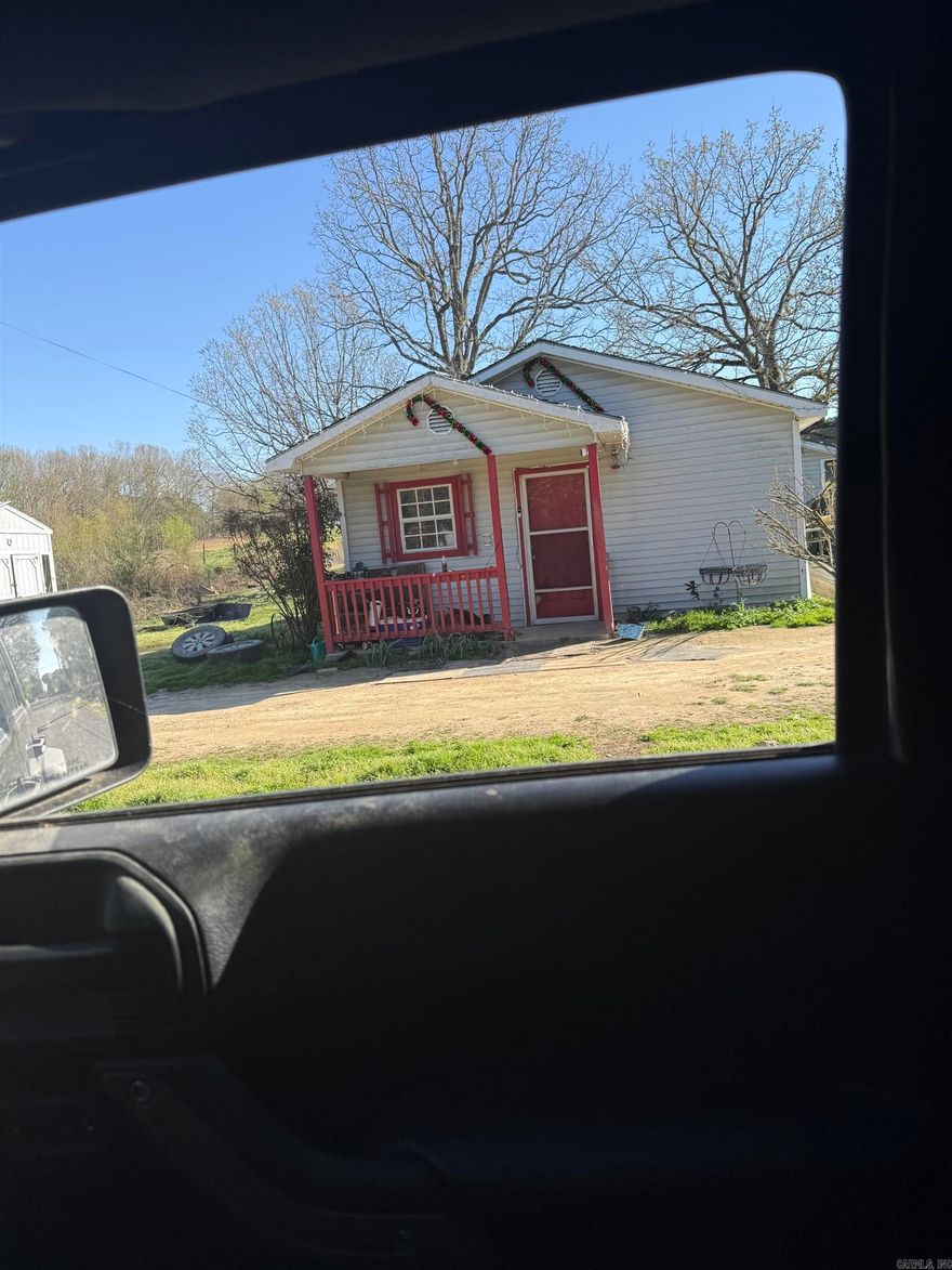 Nice little house will large yard and large trees   Washer and dryer hookups Area for a garden