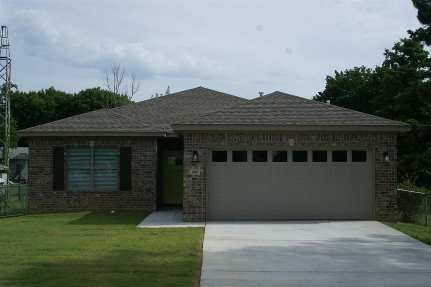 New Construction near Home Depot and I-30, solid granite tops, walk in tile custom shower, Whirlpool, covered back porch, energy saver has Low E windows, reflective roof decking, R-38 Cellulose in attic.  Low, Low utility bills.  Tray and vaulted ceilings.