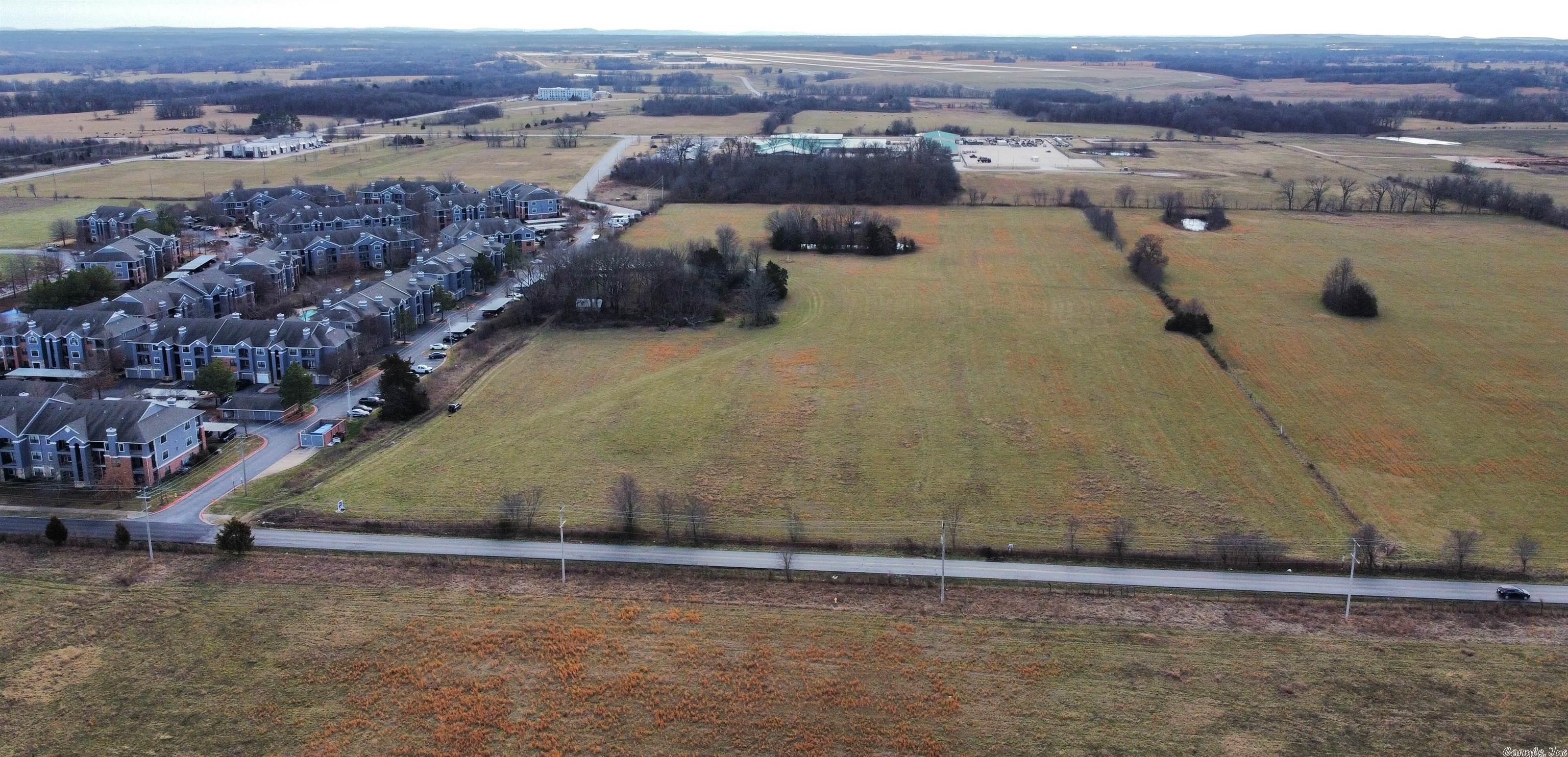 20 Acres in Bentonville City limits. Approx. 660' of Vaughn Rd Frontage and then south of the road for 1320! Adjoins Minuteman Ave on the South. Apartment complex Gleen at Polo Park are neighbors to the East. National Guard facility to the south. Mostly open pasture, gently rolling ready for development.