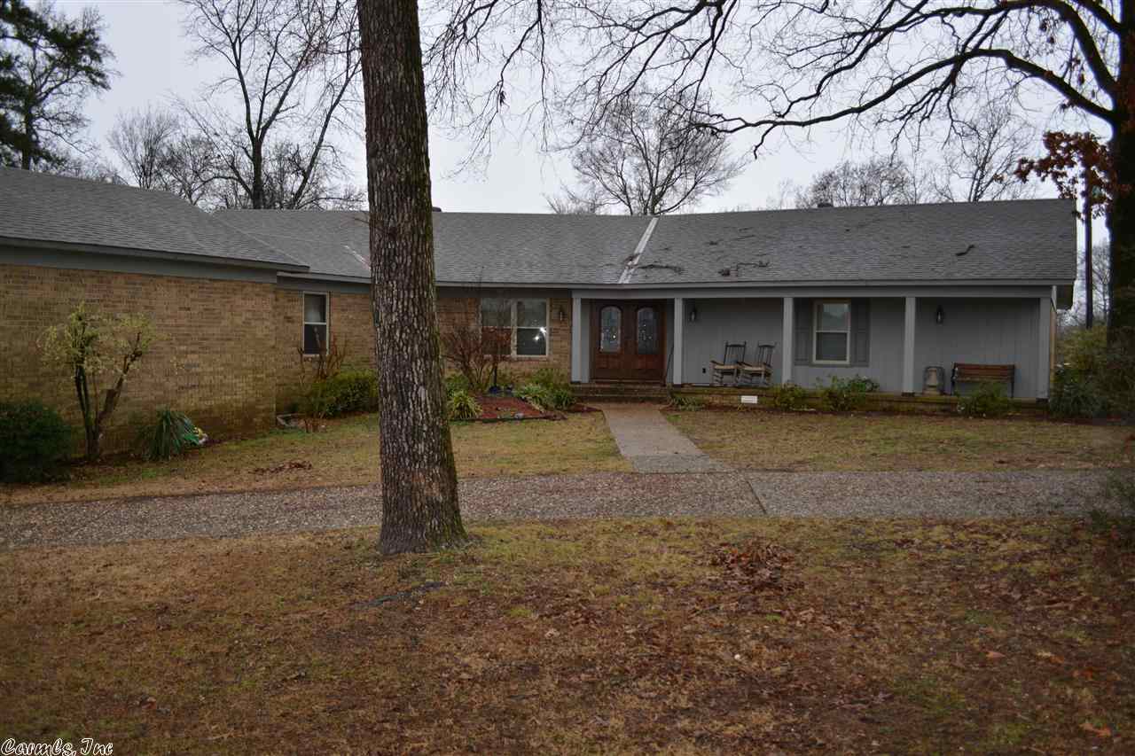 HEY OAKLAWN OWNERS!Complete breeding and show facilities with 64 stall barn, Wash bay, Large Breeding Room with Dummy and Two Stocks for Mares including area for Babies, Vet Room, hot walker, round pen, indoor and outdoor lighted arenas. 7 miles of pipe fencing. Two stocked ponds. Cleared pastureland. Two pipe Corrals with 4 Stalls Each and a 20x40 Shop. New Metal Roofs on Barns 2014. House totally remodeled and expensively updated kitchen, new hardwood floors, and more. 39 +/- Acres of Land. Saline County.