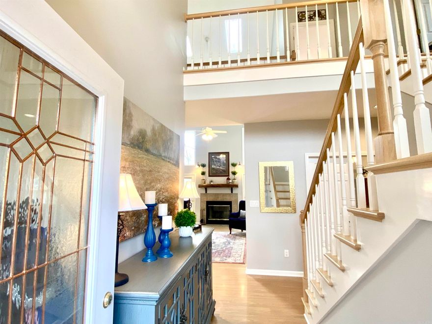 This Custom home has the WOW factor...from the bright two-story entry, the Gallery Balcony, Soaring Ceilings and Upgraded features everywhere you look, this home defintely LIVES LARGE with over 2300sf. The Open Floor Plan offers lots of Natural Light, beautiful laminate flooring thoughtout, and the primary bedroom on the main floor. The kitchen boasts a large island, granite counters, 2 pantrys, a built-in coffee bar, and a beautiful GAS stove. The primary bedroom has a sitting area, a sliding door to the deck, luxurious bath with double sink, water closet, and a spa tub, plus a walk in closet with built-ins. Upstairs you'll enjoy the views from the gallery balcony and this split plan offers 2 bedrooms, full bath, a BONUS room, an office space and 2 outdoor balconys off the bedrooms. Need STORAGE...you'll find a HUGE Unfinshed basement that includes a WORKSHOP and Safe Space, and convenient door to the back yard. There's also a cute outdoor building in the back for more storage...or use it for a hot tub or studio. The views here are breathtaking- you get gorgeous sunsets from the large deck facing woods and the mountains. See this home TODAY and love the Hot Springs Village life!