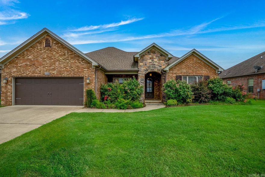 Welcome to this charming 4-bedroom home located in the sought-after Salem Woods neighborhood in Conway. This delightful residence features a desirable split floor plan and boasts high ceilings and beautiful hardwood floors throughout. The expansive kitchen completes with custom cabinets, granite countertops, stainless steel appliances, and an island. The spacious master bedroom offers a tray ceiling; master bathroom has a whirlpool tub, double vanities, and built-in storage. Enjoy your morning coffee on the large covered front porch, and revel in the stunning front garden. The fully fenced backyard with a covered patio is ideal for family gatherings and entertaining.This home combines elegance and functionality in a prime location. Don't miss your chance to make it yours!