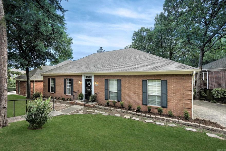 A Rare Find!  Cambridge Place Patio Home is conveniently located in the heart of WLR with an guest/in-law addition.  The main home is approx. 1955 SF with an open great room with fireplace and formal dining room, kitchen with an eat-in area: all with hardwood floors.  2 bedrooms with a hall bathroom and a large primary bedroom with en-suite bathroom with separate shower, tub, 2 sink vanity.  The guest/in-law/bonus area is approx. 1,000 SF (please measure for accuracy) with an upstairs bedroom and full bathroom with walk-in shower and a downstairs bonus/den area with an area set up for a future kitchenette and an exterior door to its own deck.  Sprinkler system to the front yard only. POA includes the use of the Cambridge Place clubhouse, pool and tennis courts and trash pickup.