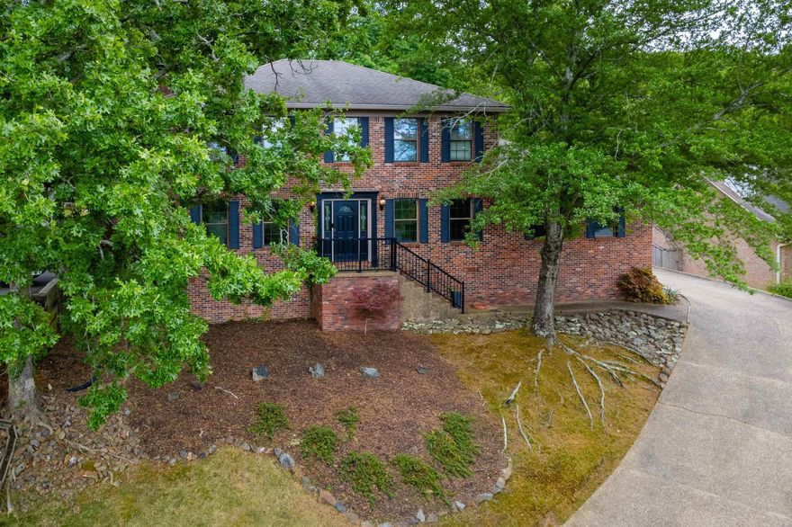 Lovely 3 bedroom traditional brick home in Hillsborough with newer roof, updated kitchen and two living areas. Freshly painted interior and level fully fenced backyard with additional parking pads at top of driveway for additional use. Located just around the corner from Pulaski Academy.