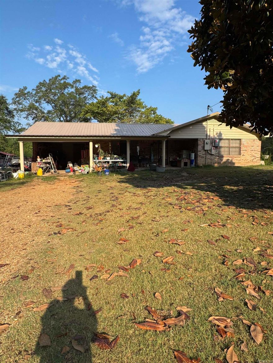 SINGLE STORY BRICK HOME WITH ATTACHED GARAGE ON 5.70 ACRES. TAKE ADVANTAGE OF AMPLE LAND AND NATURAL SURROUNDINGS. THIS HOME OFFERS SOLAR PANELS TO OFFSET UTILITY BILLS.