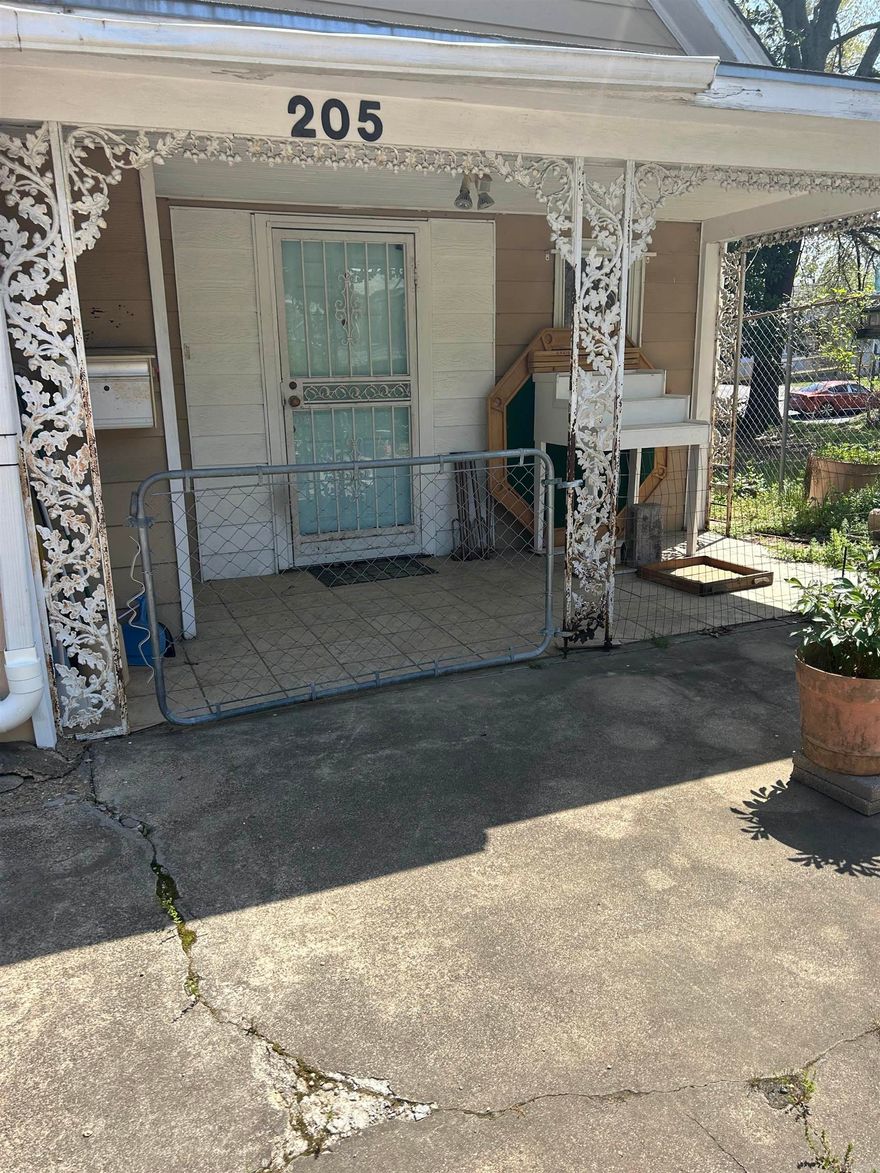 Don't miss this one! A 3/2 house with hardwood floors and two living areas. The basement opens up to a business space with 37 ft. frontage on Central Ave. Perfect for a small business! Just minutes from Oaklawn! Call today to see!