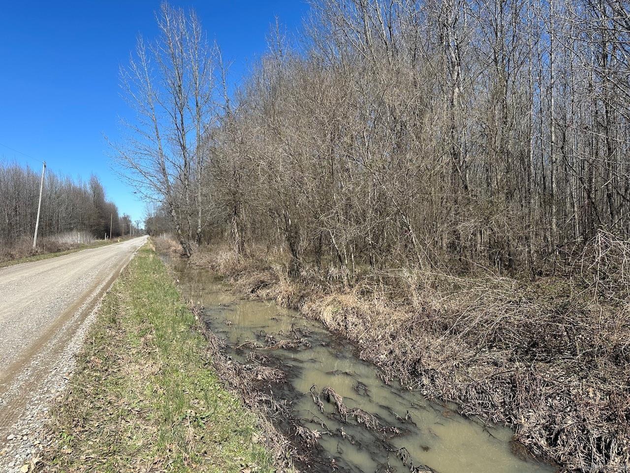 This property is 30 acres off of Anderson Road and is immediately south of Russell, AR and just up the road from Bald Knob, AR. It sits just a stones throw from 67/167 providing very easy access to the property. There are several existing deer stands on the property and a pipeline runs through the property providing an excellent place to rifle hunt. There is power and water at the road, but has not been installed on the property. No minerals. Maps show approximate property lines.
