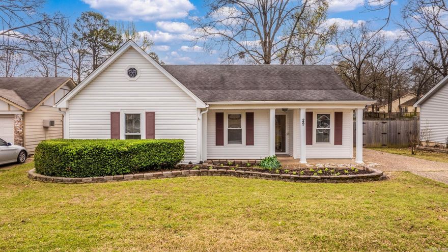 If you've been searching for the home that stops you mid-scroll, this is it. Tucked inside Oak Forest, 29 Oak Forest Drive isn't just the best house on the street — it's the one neighbors have been watching for years wondering when it would hit the market. The moment you step inside, the vaulted ceiling with exposed beams and stunning brick fireplace tell you this isn't your average listing. The kitchen alone is worth the drive — quartz countertops, a gas range, crisp white cabinetry and a mosaic tile backsplash that belongs in a design magazine. Rich hardwood floors carry you through to a primary suite that feels like a private retreat, complete with a double-vanity ensuite finished in quartz. And then there's the screened sunroom — a sprawling, sun-drenched bonus space with dual ceiling fans that will quickly become your favorite room in the house. Outside, a fenced backyard with a fire pit and patio sets the scene for the kind of evenings you'll actually look forward to. Three bedrooms, two baths, an attached garage and a charming covered front porch round out this rare find. Homes like this don't wait. Neither should you.