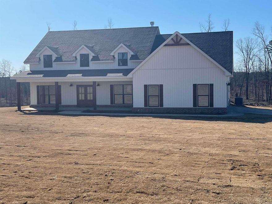Welcome to this stunning new construction home set on a full one acre lot, designed with a bright open floor plan. Home offers perfect blend of comfort and style. Features beautiful custom wooden beams in entry way, livings area and office/formal dining room.  Large walkin pantry and quartz countertops in kitchen. Split bedrooms with jack-and-jill bathroom and large primary bathroom with double vanities and huge closet. Covered back porch and located in Bauixite School District.
