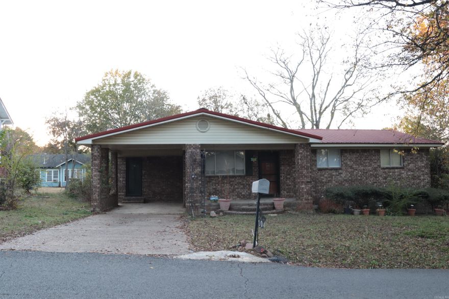 Cute, updated home. New paint, flooring, electric stove, and furnace. The metal roof is approximately 5 years old. Refrigerator and washer and dryer stay. NO SELLERS DISCLOSURE- The seller never lived in the home.  AGENTS SEE REMARKS